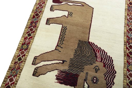 Backside of handmade 2000s Persian Gabbeh rug showing knot structure and weave density