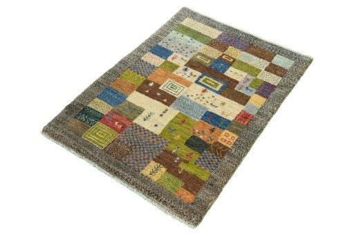 Corner detail of New Persian Gabbeh rug showing border pattern and Wool pile