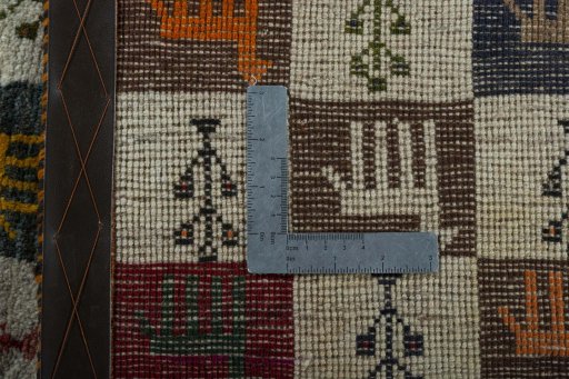 Close-up detail of 2000s Persian Gabbeh rug from Iran / Persia showing Wool weave
