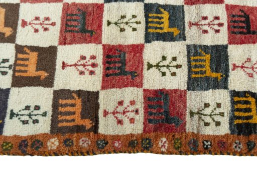 Close-up detail of 2000s Persian Gabbeh rug from Iran / Persia showing Wool weave