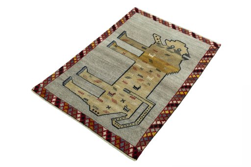 Corner detail of 2000s Persian Gabbeh rug showing border pattern and Wool pile