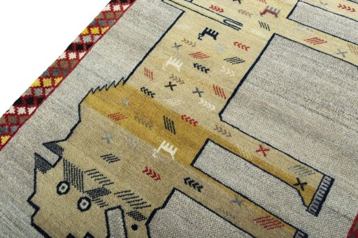Backside of handmade 2000s Persian Gabbeh rug showing knot structure and weave density