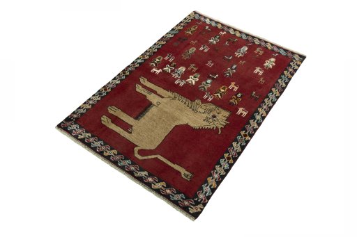 Corner detail of 2000s Persian Gabbeh rug showing border pattern and Wool pile
