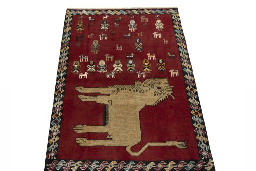 Surface texture of 2000s Persian Gabbeh rug with natural Wool and intricate pattern