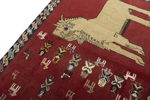 Backside of handmade 2000s Persian Gabbeh rug showing knot structure and weave density