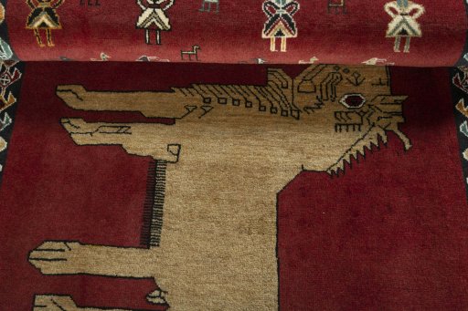 Full view of 2000s Persian Gabbeh rug from Iran / Persia, 151 × 102 cm in Red tones