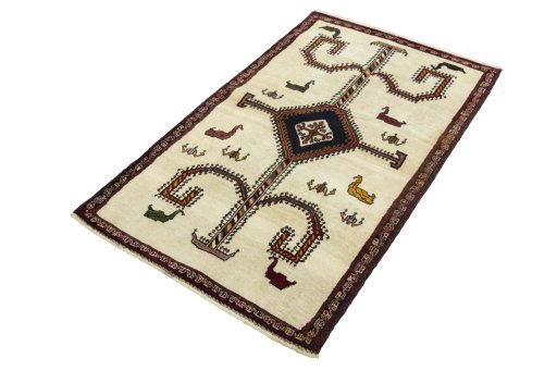 Corner detail of 2000s Persian Gabbeh rug showing border pattern and Wool pile