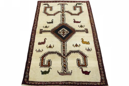 Surface texture of 2000s Persian Gabbeh rug with natural Wool and intricate pattern