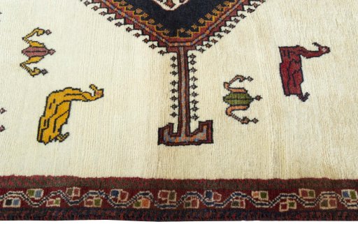 Full view of 2000s Persian Gabbeh rug from Iran / Persia, 178 × 103 cm in Beige tones