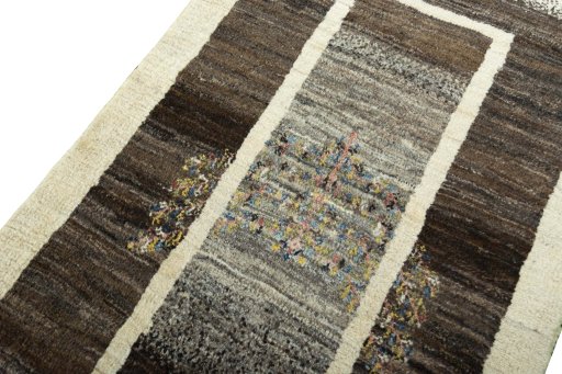 Backside of handmade New Persian Gabbeh rug showing knot structure and weave density