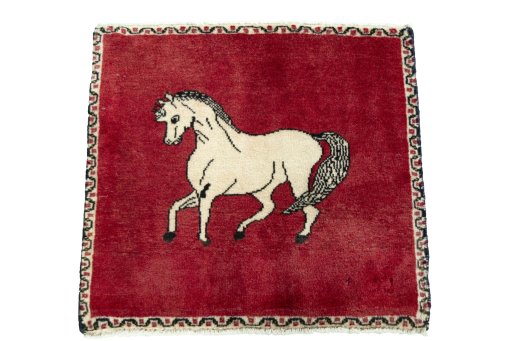 Surface texture of 2000s Persian Gabbeh rug with natural Wool and intricate pattern