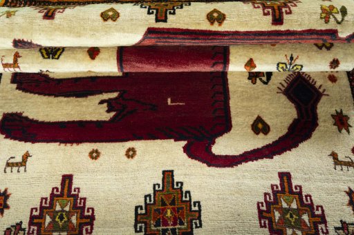 Full view of 1970s Persian Gabbeh rug from Iran / Persia, 205 × 128 cm in Beige tones