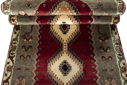 Full view of 2000s Persian Gabbeh rug from Iran / Persia, 290 × 105 cm in Red tones