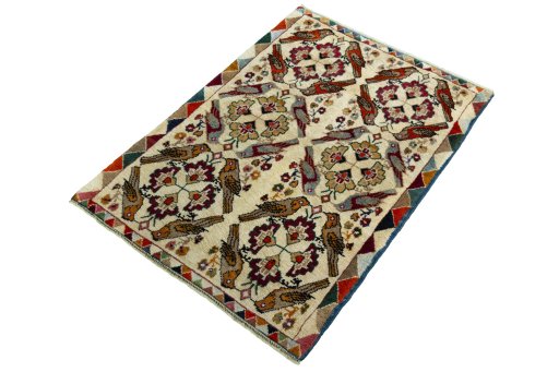 Corner detail of 2000s Persian Gabbeh rug showing border pattern and Wool pile