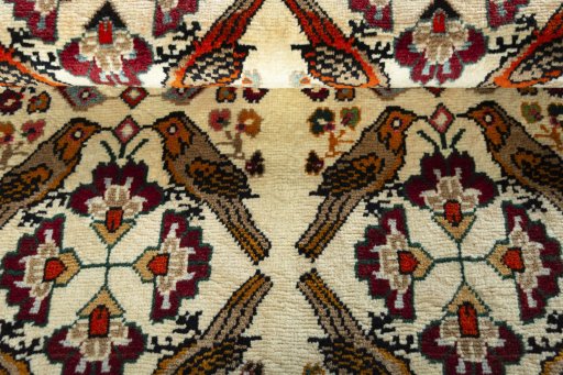 Full view of 2000s Persian Gabbeh rug from Iran / Persia, 125 × 88 cm in Beige tones