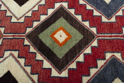 Central medallion detail of 2000s Persian Gabbeh rug from Iran / Persia