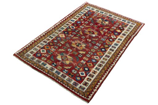 Corner detail of 2000s Persian Gabbeh rug showing border pattern and Wool pile