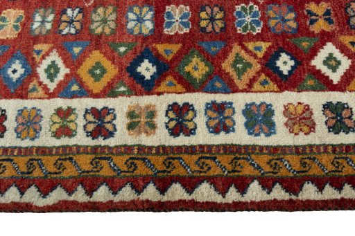 Close-up detail of 2000s Persian Gabbeh rug from Iran / Persia showing Wool weave
