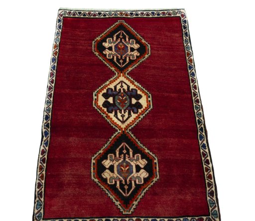 Surface texture of 2000s Persian Gabbeh rug with natural Wool and intricate pattern