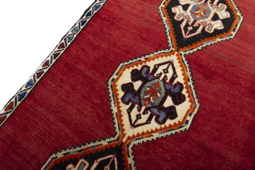 Backside of handmade 2000s Persian Gabbeh rug showing knot structure and weave density