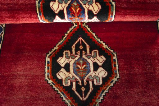 Full view of 2000s Persian Gabbeh rug from Iran / Persia, 144 × 85 cm in Red tones