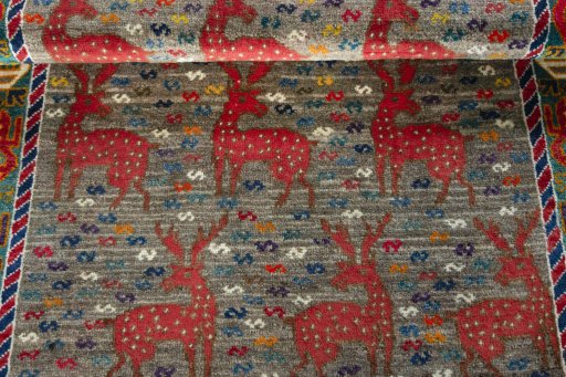 Full view of 2000s Persian Gabbeh rug from Iran / Persia, 170 × 106 cm in Gray tones