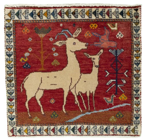 Full view of 1970s Persian Gabbeh rug from Iran / Persia, 60 × 63 cm in Red tones