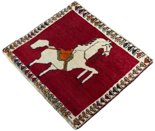 Corner detail of 1970s Persian Gabbeh rug showing border pattern and Wool pile