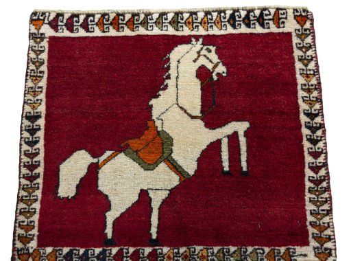 Surface texture of 1970s Persian Gabbeh rug with natural Wool and intricate pattern