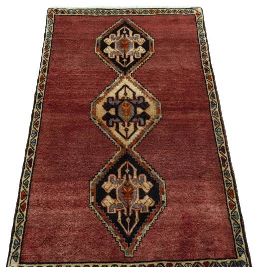 Surface texture of 2000s Persian Gabbeh rug with natural Wool and intricate pattern