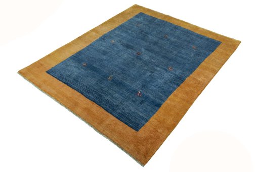 Corner detail of New Persian Gabbeh rug showing border pattern and Wool pile