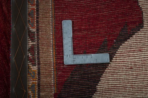 Close-up detail of 2000s Persian Gabbeh rug from Iran / Persia showing Wool weave