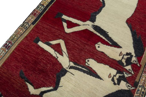 Backside of handmade 2000s Persian Gabbeh rug showing knot structure and weave density