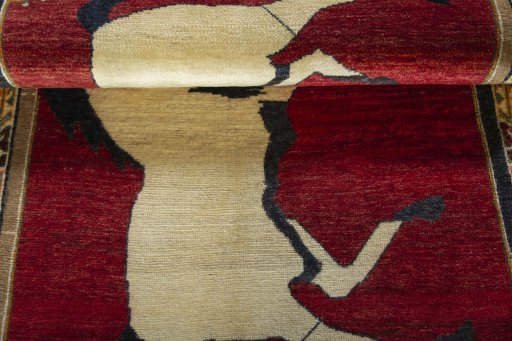Full view of 2000s Persian Gabbeh rug from Iran / Persia, 176 × 101 cm in Red tones