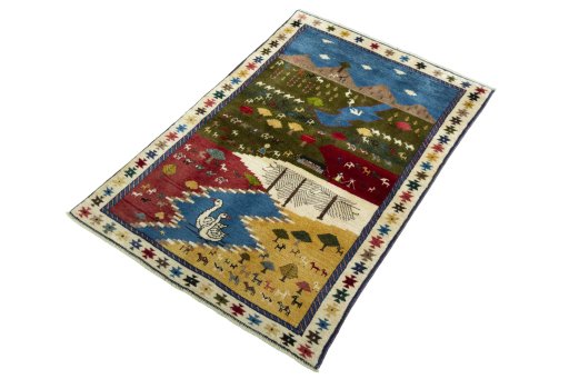 Corner detail of 2000s Persian Gabbeh rug showing border pattern and Wool pile