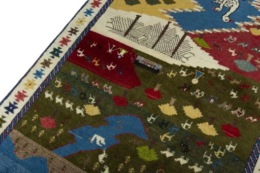 Backside of handmade 2000s Persian Gabbeh rug showing knot structure and weave density