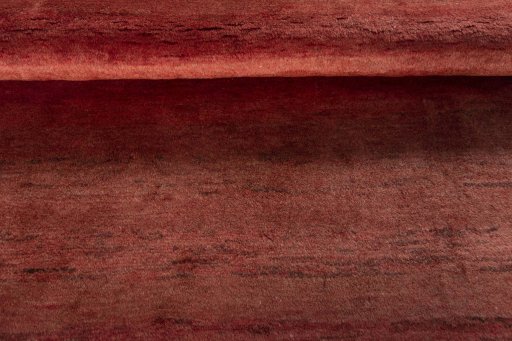 Full view of 2000s Persian Gabbeh rug from Iran / Persia, 197 × 151 cm in Red tones