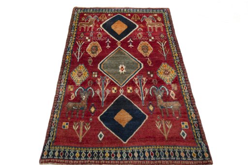 Surface texture of 2000s Persian Gabbeh rug with natural Wool and intricate pattern