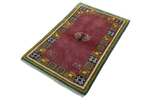 Corner detail of New Persian Gabbeh rug showing border pattern and Wool pile