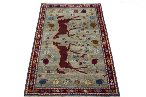 Surface texture of 2000s Persian Gabbeh rug with natural Wool and intricate pattern
