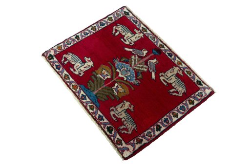 Corner detail of 2000s Persian Gabbeh rug showing border pattern and Wool pile