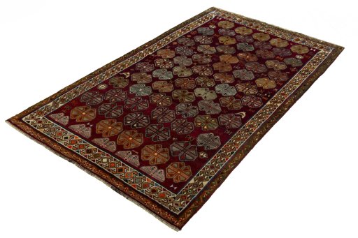 Corner detail of 2000s Persian Gabbeh rug showing border pattern and Wool pile