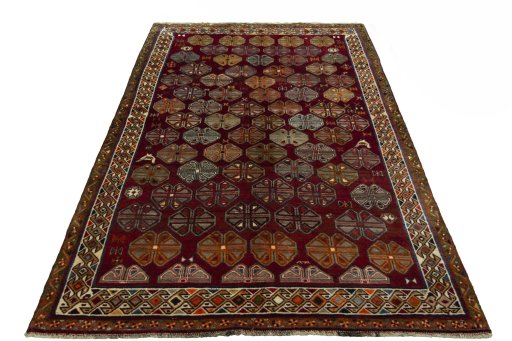 Surface texture of 2000s Persian Gabbeh rug with natural Wool and intricate pattern