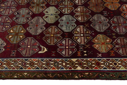 Close-up detail of 2000s Persian Gabbeh rug from Iran / Persia showing Wool weave