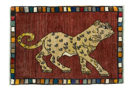 Full view of 2000s Persian Gabbeh rug from Iran / Persia, 91 × 65 cm in Red tones