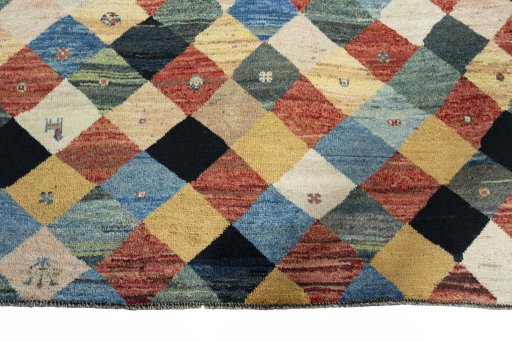 Central medallion detail of 2000s Persian Gabbeh rug from Iran / Persia