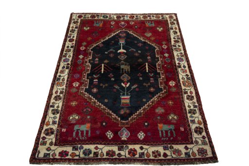 Surface texture of 2000s Persian Gabbeh rug with natural Wool and intricate pattern