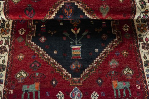 Full view of 2000s Persian Gabbeh rug from Iran / Persia, 180 × 121 cm in Blue tones