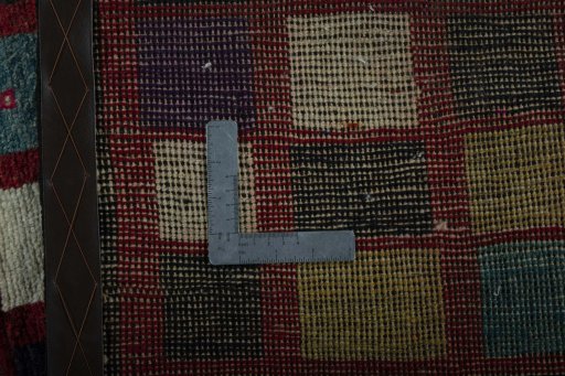 Close-up detail of 2000s Persian Gabbeh rug from Iran / Persia showing Wool weave