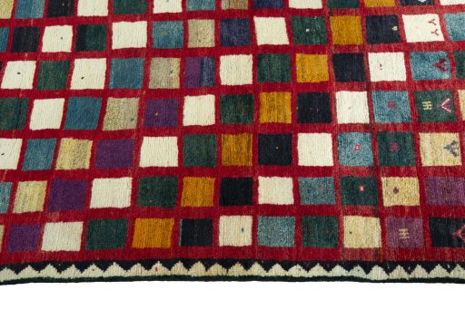 Close-up detail of 2000s Persian Gabbeh rug from Iran / Persia showing Wool weave
